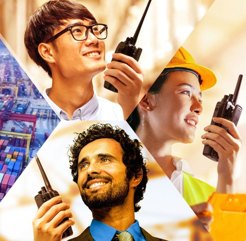 Port workers using iCOM radios at a container terminal