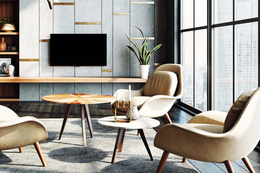 A living space with a wall-mounted display and audio equipment